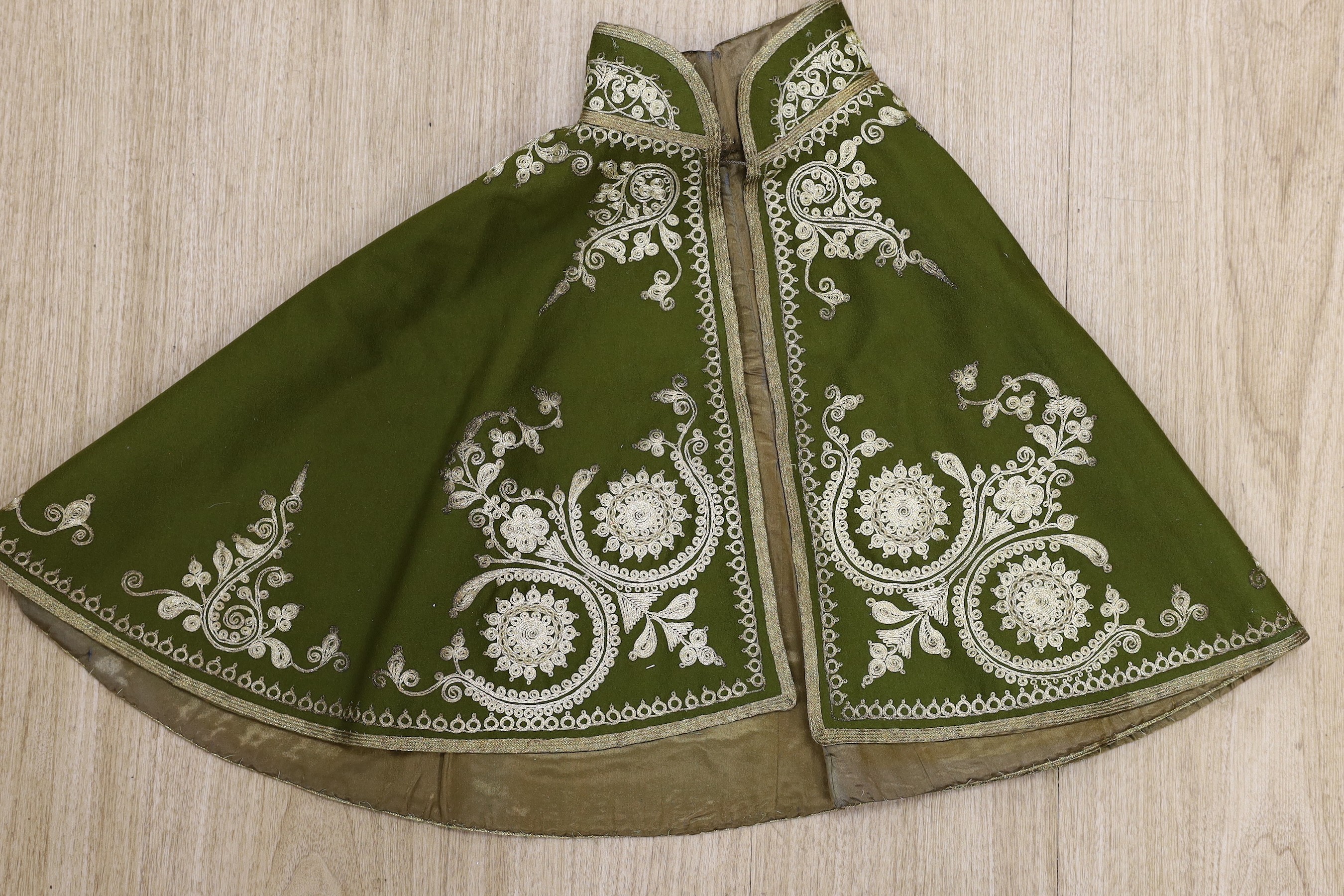 A Victorian child's waistcoat and cloak